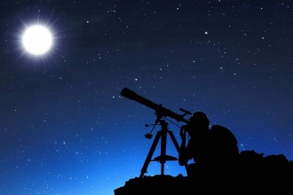 Telescope looking at the night sky