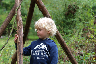 Boy looking at log