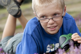 Watch boy with binoculars