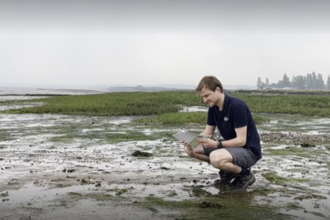 Alex Smith surveying seagrass.