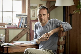 Auther James Henry at desk.