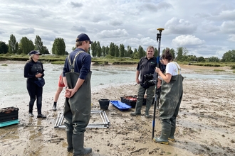 Marine conservation team undertaking seagrass surveys.