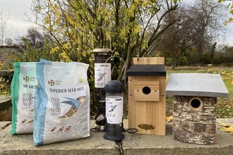 Bird feed, bird feeders and nest boxes