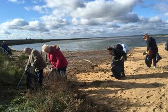 Litter Pickers on the beach