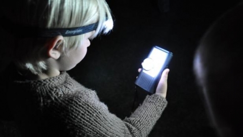 child using a bat detector