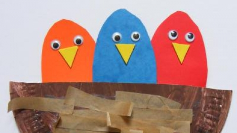 Craft birds in a nest