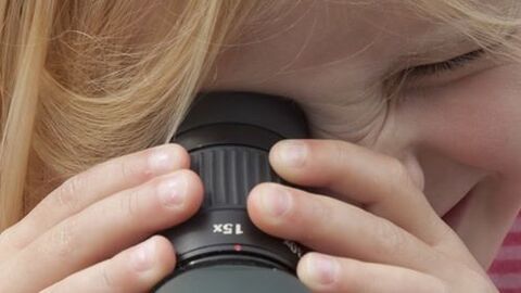Abberton girl looking through scope 