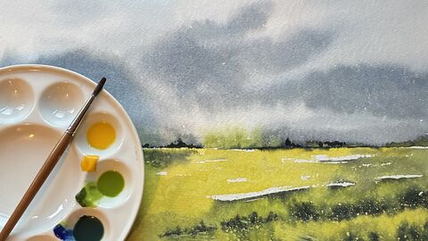 Watercolour of the countryside with paints.