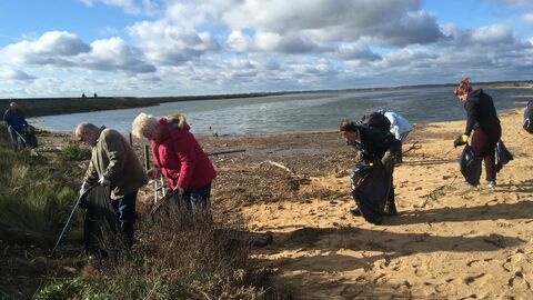Litter Pickers on the beach