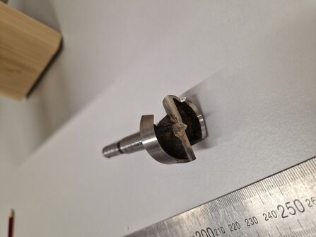 Frostner bit to be used with a drill.