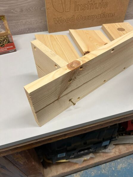 Fitting the base to the back panel.