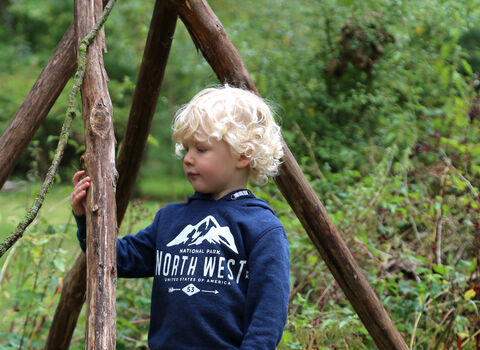 Boy looking at log