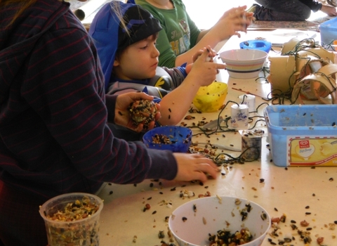 Children making bird feed